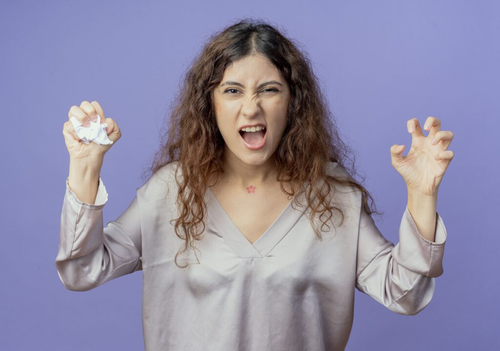 A women seemingly stressed about something.